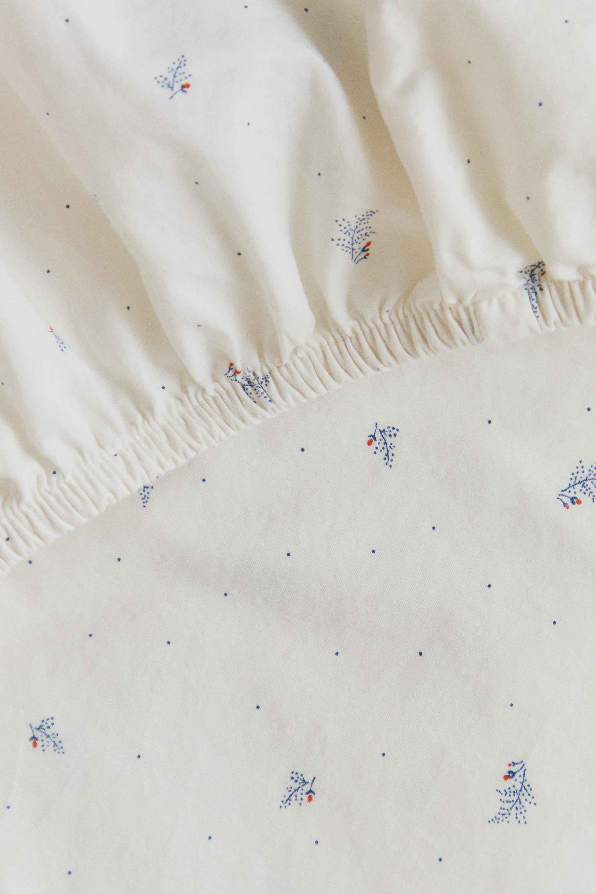 KIDS' COTTON FITTED SHEET WITH LEAVES AND DOTS